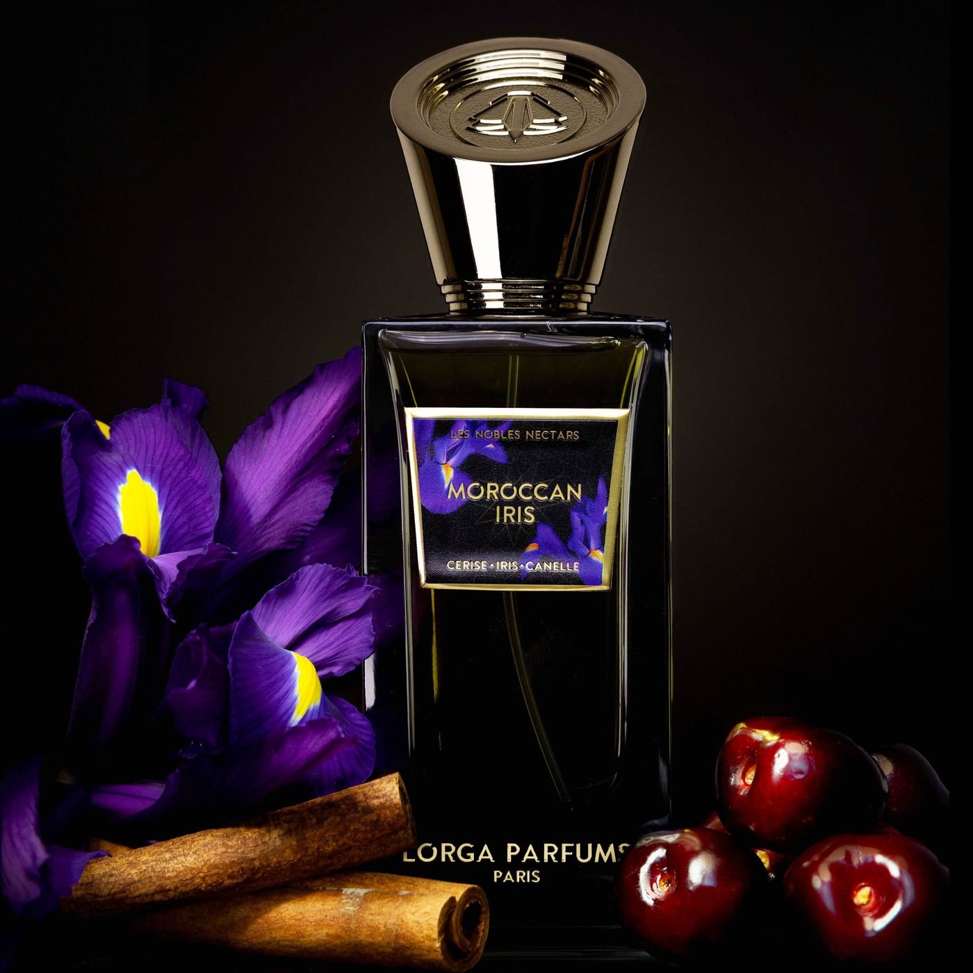 Flacon Moroccan Iris de LORGA PARFUMS entouré d’iris, de cerises et de cannelle